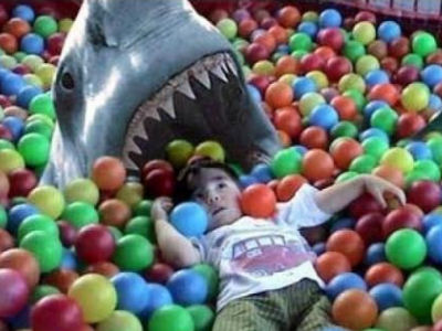 Help! Help! This child is attacking my shark!